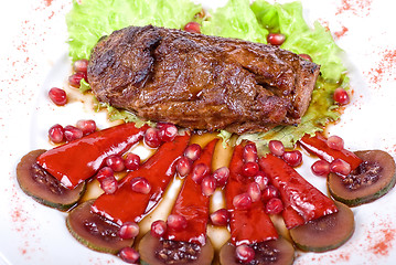 Image showing beef steak with pomegranate