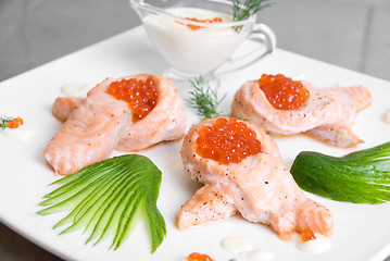 Image showing roasted salmon filet with red caviar