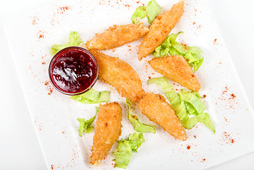 Image showing Baked cheese with cranberries sauce