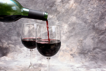 Image showing pouring red wine with copy space