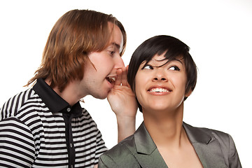 Image showing Attractive Diverse Couple Whispering Secrets