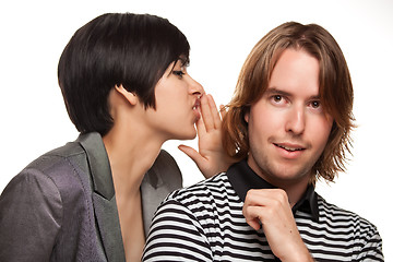 Image showing Attractive Diverse Couple Whispering Secrets