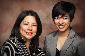 Image showing Attractive Multiethnic Mother and Daughter Studio Portrait