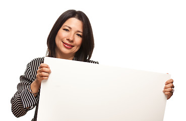 Image showing Attractive Multiethnic Woman Holding Blank White Sign