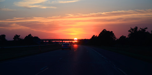 Image showing Sunset above the road