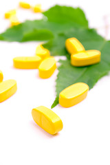 Image showing yellow vitamin pills