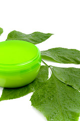 Image showing face cream with green leaf