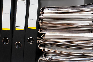 Image showing Three folders and documents