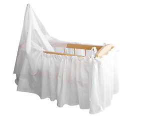 Image showing Wooden Bassinet with White Drapes