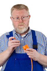 Image showing Electrician with circuit tester