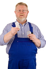 Image showing Electrician with light bulbs