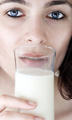 Image showing Young people eating milk.