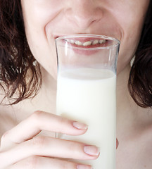 Image showing Young people eating milk.