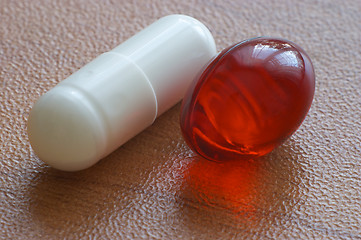 Image showing Red gelatine pill and capsule