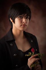 Image showing Pretty Multiethnic Young Adult Woman Portrait with Rose