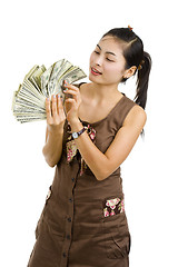 Image showing pretty woman happy with lots of money