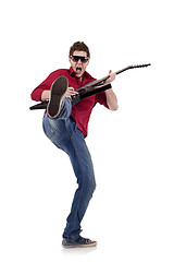 Image showing kicking guitaris