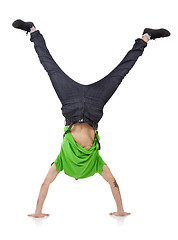 Image showing boy standing on hands