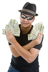 Image showing man with lots of 100 dollar notes