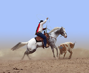 Image showing Cowboy Roping a Steer