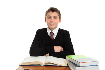 Image showing Schoolboy at desk