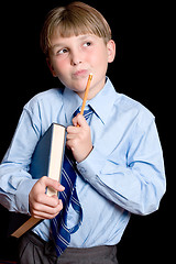 Image showing Thinking School boy student