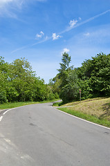 Image showing Rural road on bright sunny day