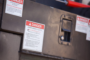 Image showing Overturning Hazard Notice on Utility Truck