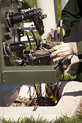 Image showing Utility Workers Installing New Electrical Equipment