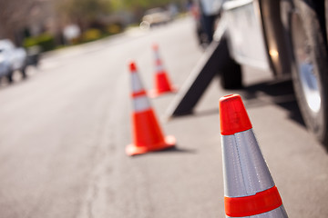 Image showing Orange Hazard Cones and Utility Truck in Street