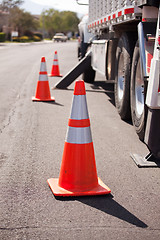 Image showing Orange Hazard Cones and Utility Truck in Street