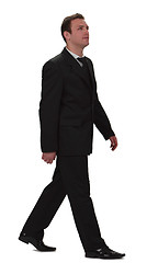 Image showing Businessman walking