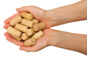 Image showing Hands with wine corks