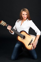 Image showing Woman with guitar.