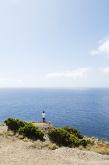 Image showing Young man looking at sea