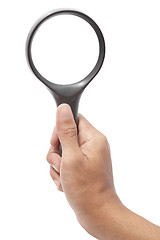 Image showing Hand with magnifying glass