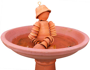 Image showing Flower pot man in a Bird Bath