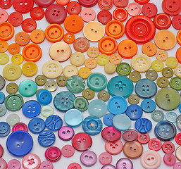 Image showing rainbow fashion - colored buttons