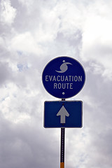 Image showing Evacuation Route Sign in Florida against storm clouds