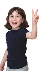 Image showing Laughing cute little years girl shows V-sign isolated