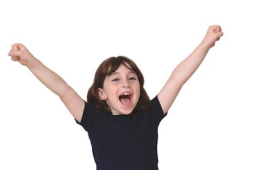 Image showing Cute little years girl raises her arms in a victory sign isolated