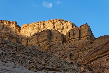 Image showing Golden rock in the desert at sunset 