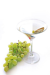 Image showing Very sweet white wine in the martini glasses isolated on white 