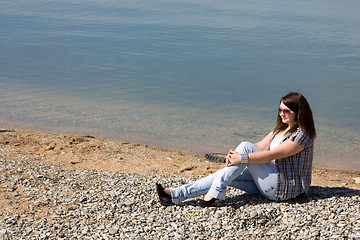 Image showing A young girl on the beach