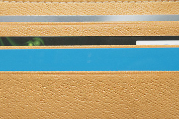 Image showing Yellow wallet with plastic cards