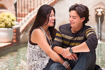 Image showing Attractive Hispanic Couple At A Fountain