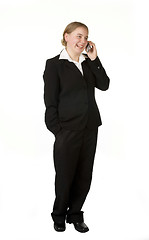 Image showing young business woman on mobile phone 