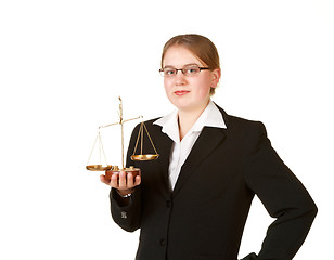 Image showing young business woman with scales