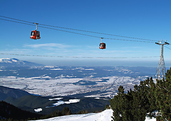 Image showing Cable car ski lift over mountain landscape