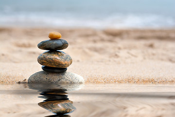 Image showing Stacked Zen Rocks Reflection